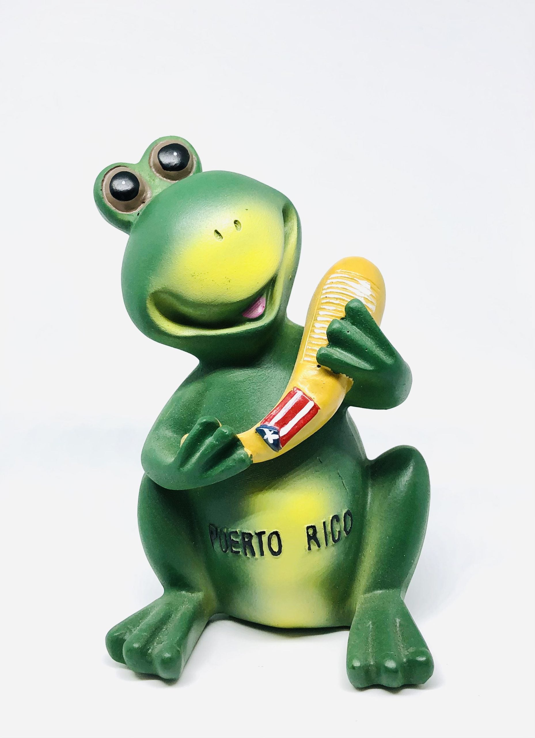 Figura de coquí con güiro