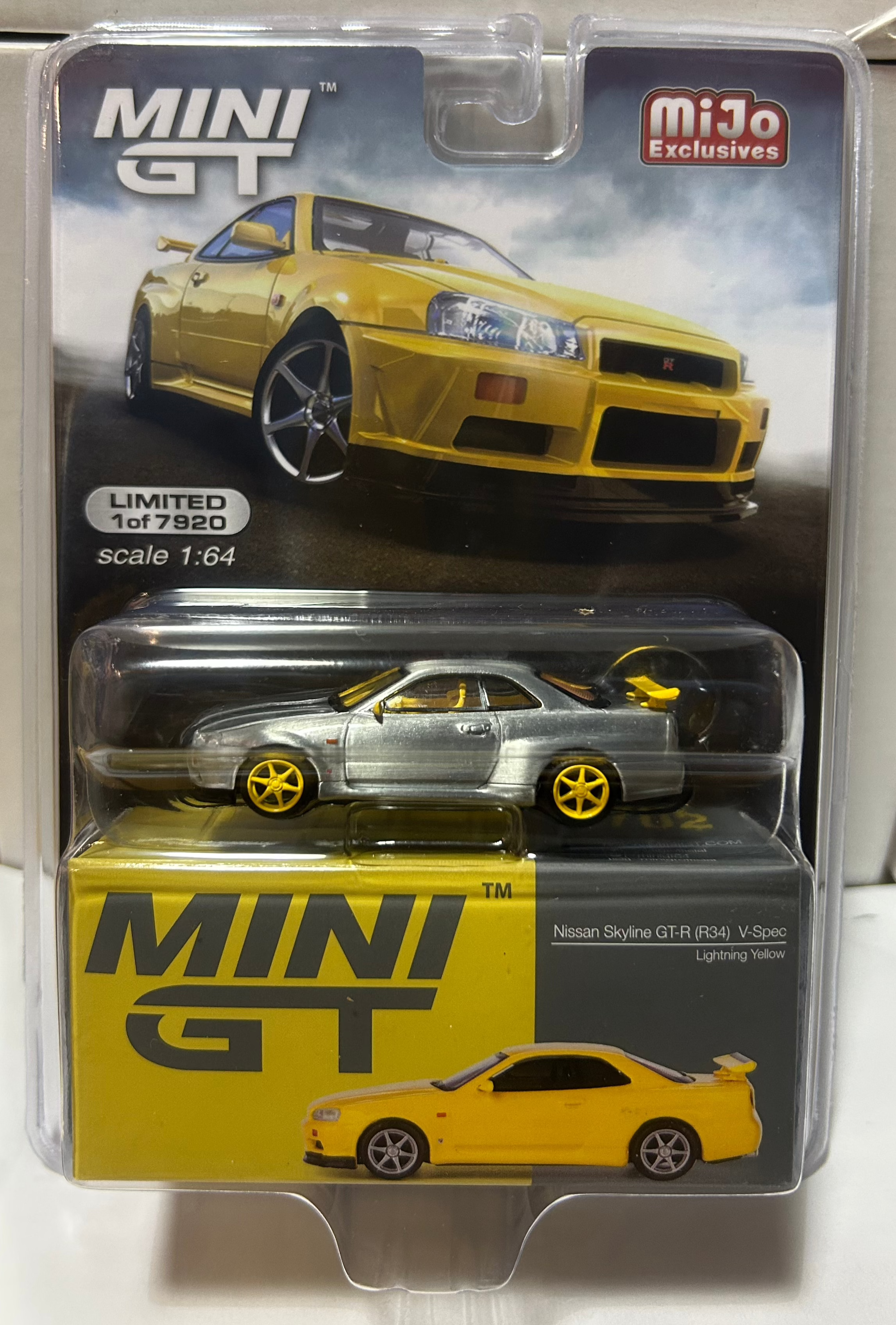 1/64 NISSAN SKYLINE GT-R (R34) V-SPEC YELLOW (CHASE "RAW") - MINI GT