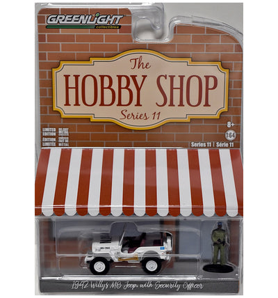 FIGURA DEL JEEP WILLYS MB 1942 CON AGENTE DE SEGURIDAD A ESCALA 1/64 - THE HOBBY SHOP SERIE 11