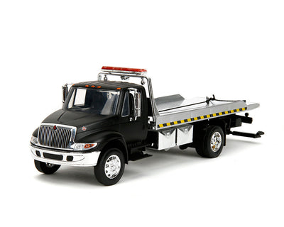 1/24 CAMIÓN DE REMOLQUE INTERNACIONAL DURASTAR 4400 PLATAFORMA - NEGRO