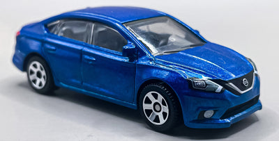 1/64 2016 NISSAN SENTRA AZUL - CAJA DE MEZCLAS