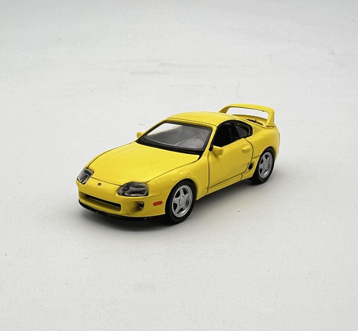 1/64 1996 TOYOTA SUPRA YELLOW - ASIA SPECIAL EDITION